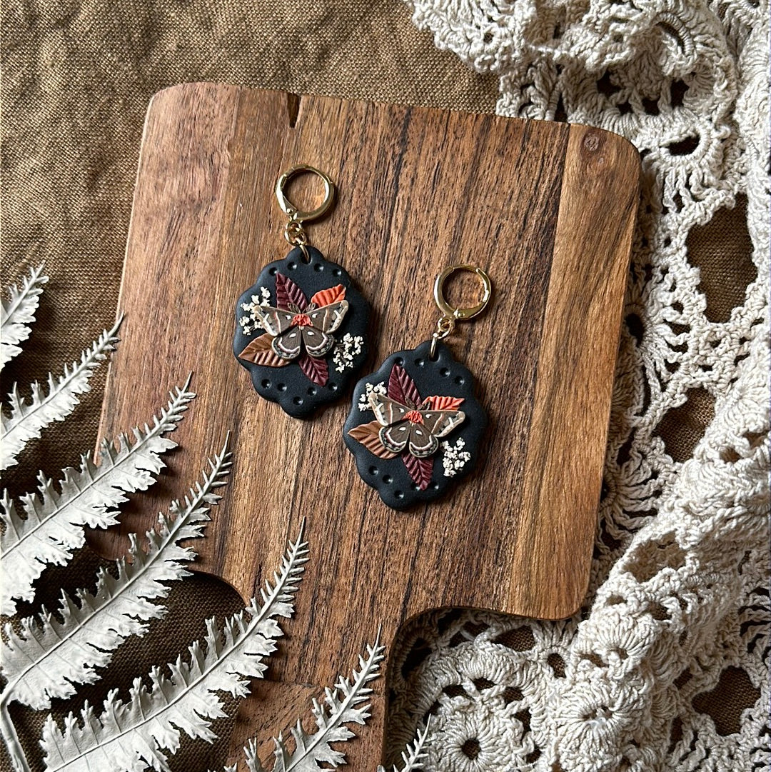 Floral cecropia moth scallop framed earrings