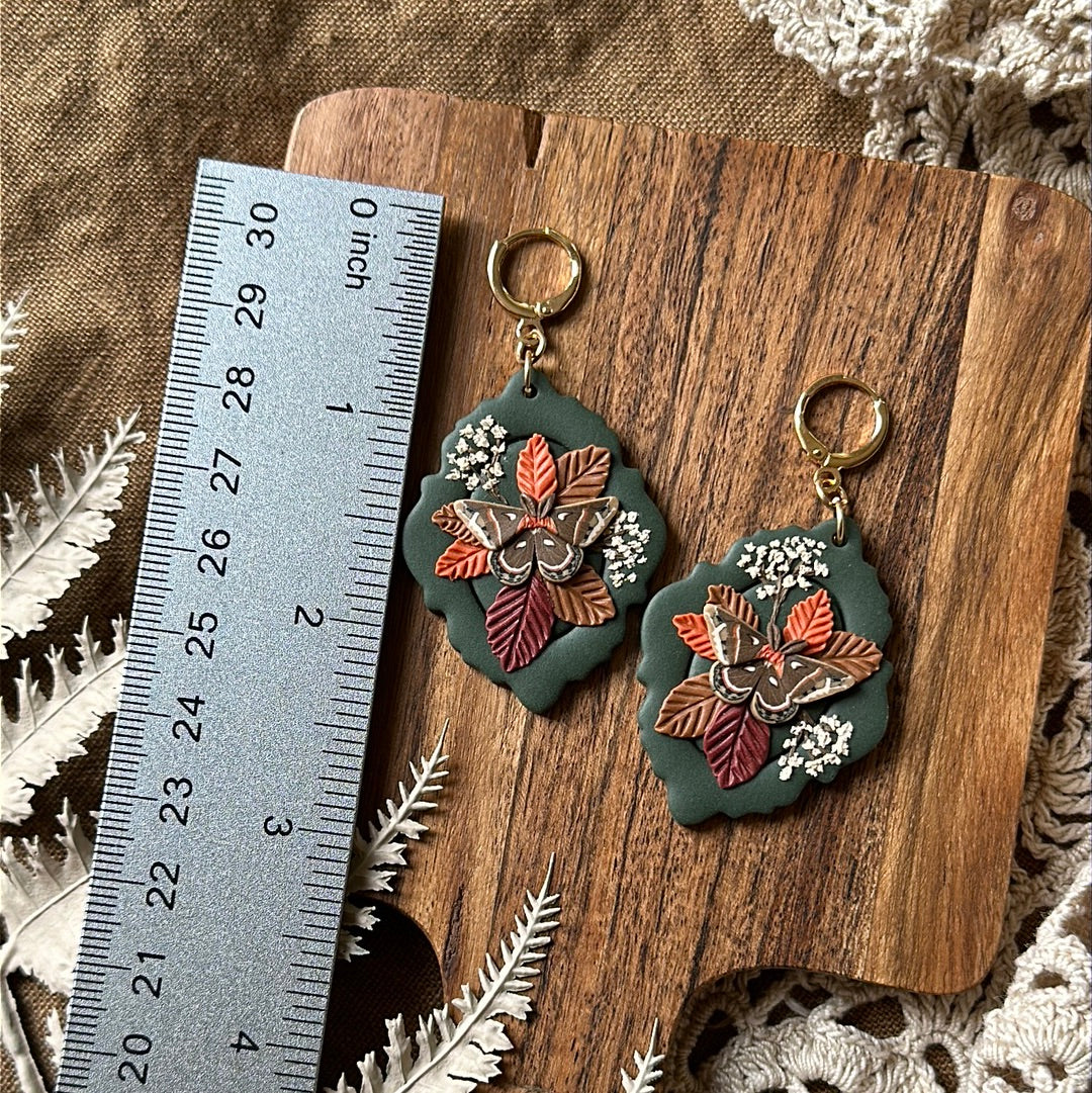 Floral cecropia moth framed earrings