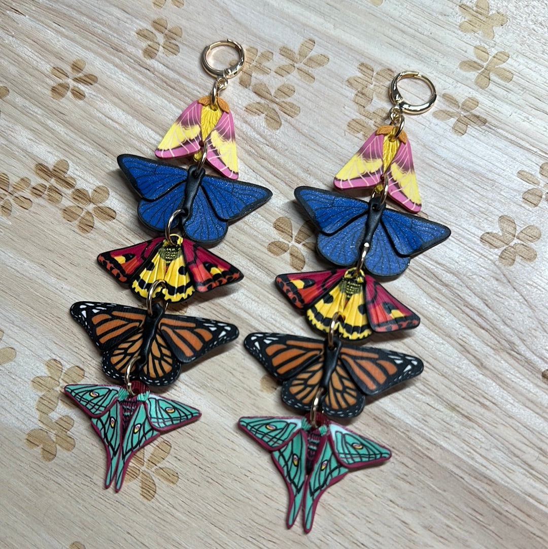 Stacked butterfly and moth dangles
