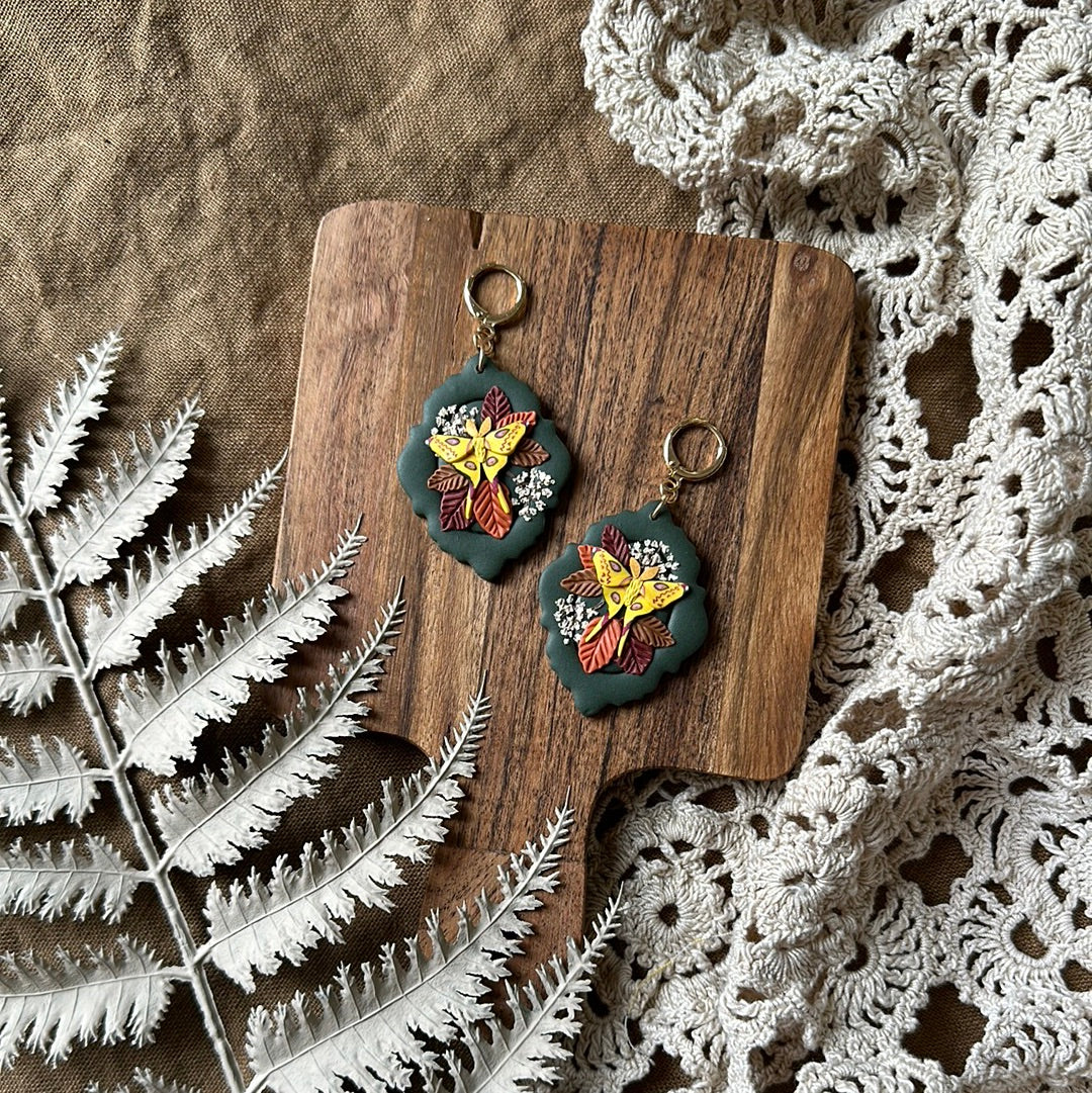 Comet moth and floral framed earrings
