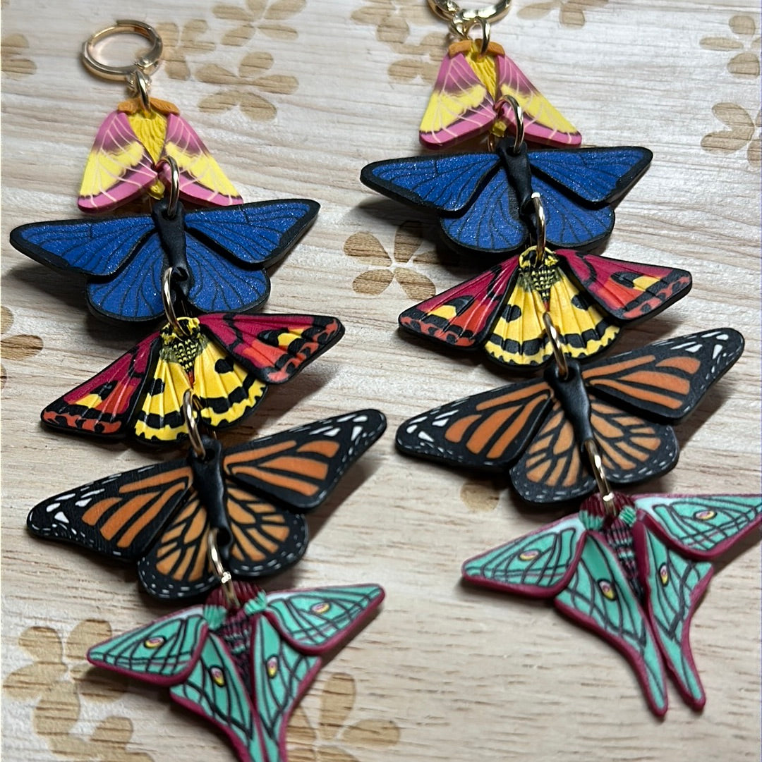 Stacked butterfly and moth dangles