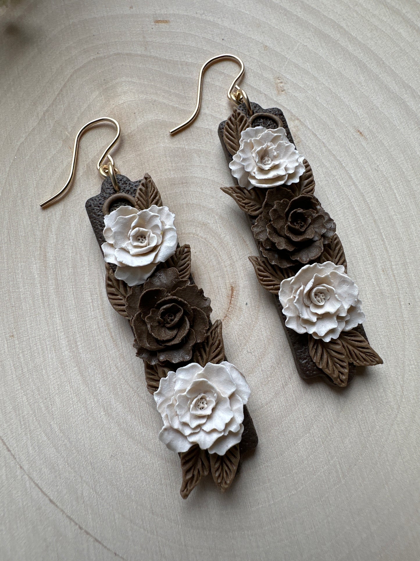 Brown floral bar dangles