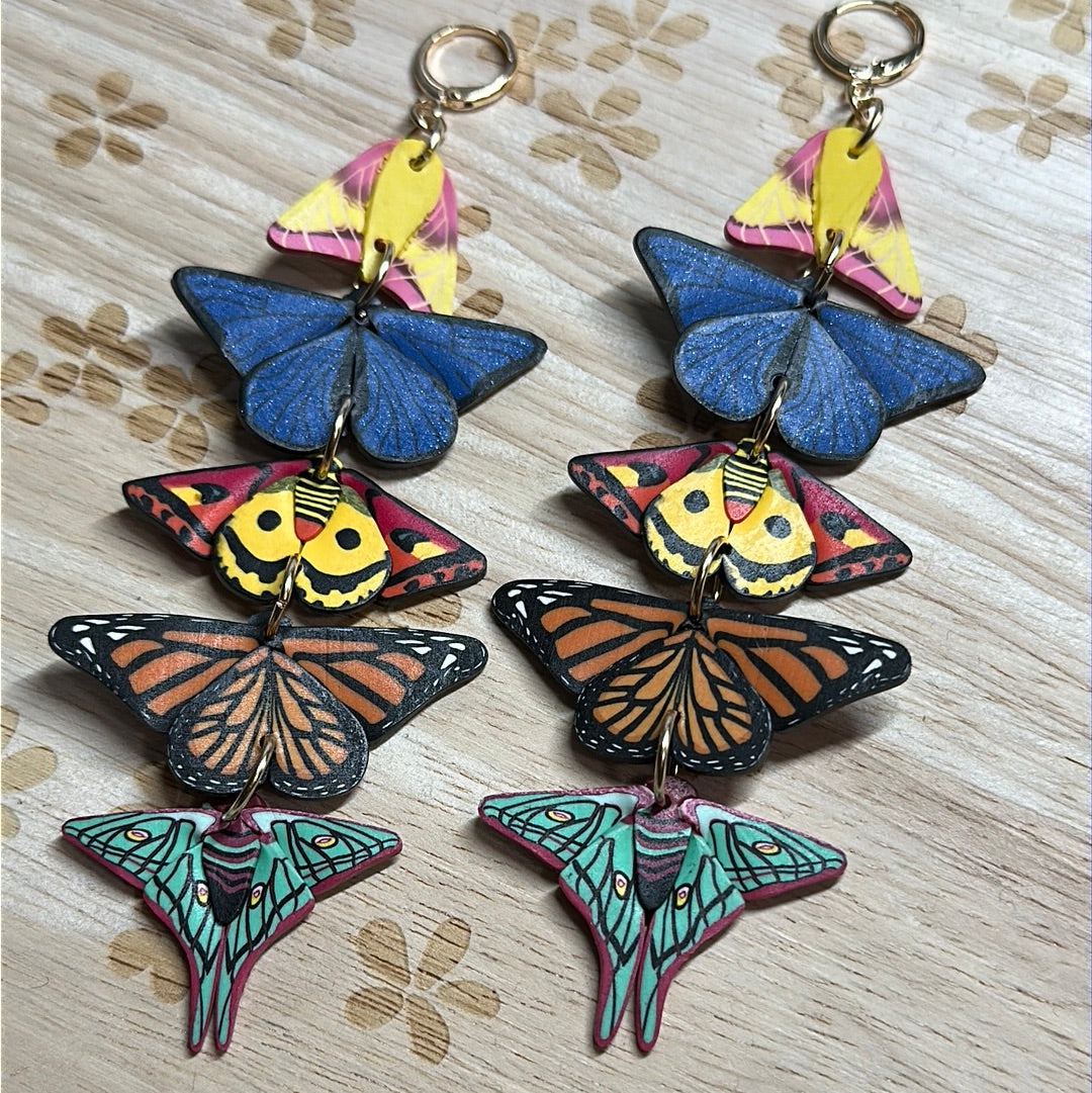 Stacked butterfly and moth dangles