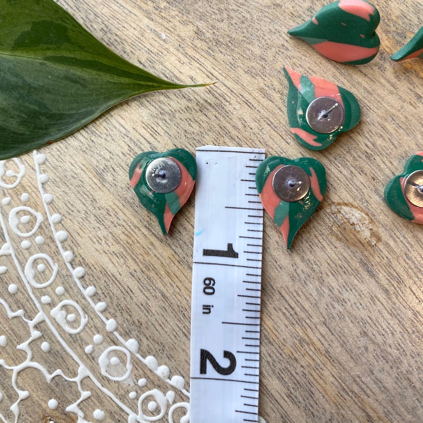 Pink princess philodendron leaf plant studs