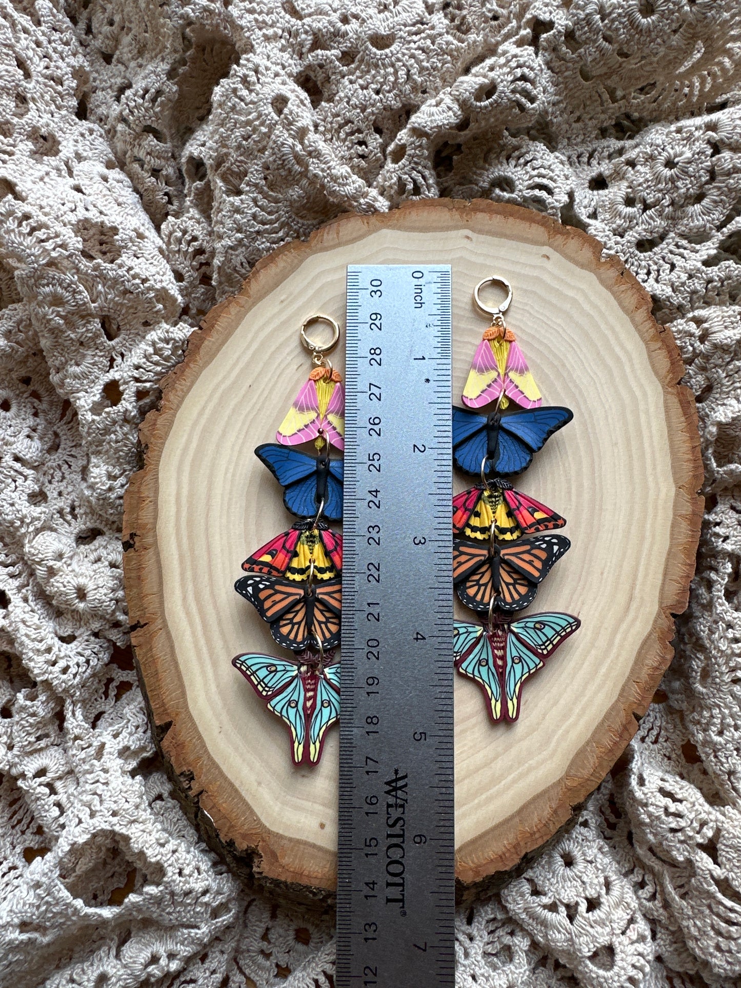 Stacked butterfly and moth dangles
