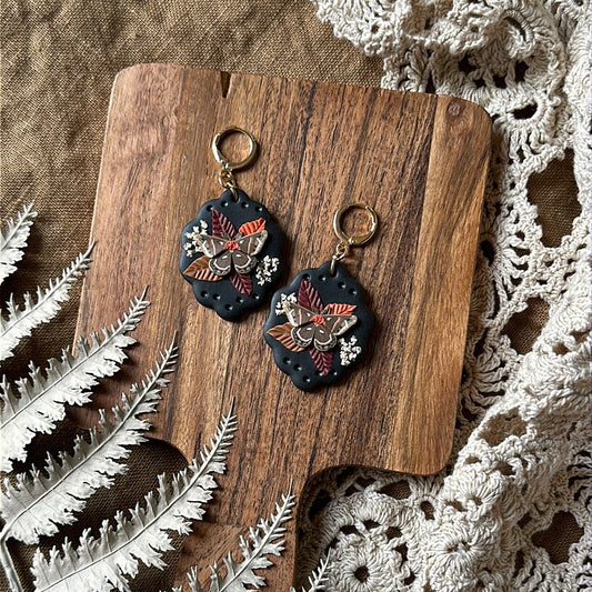 Floral cecropia moth scallop framed earrings