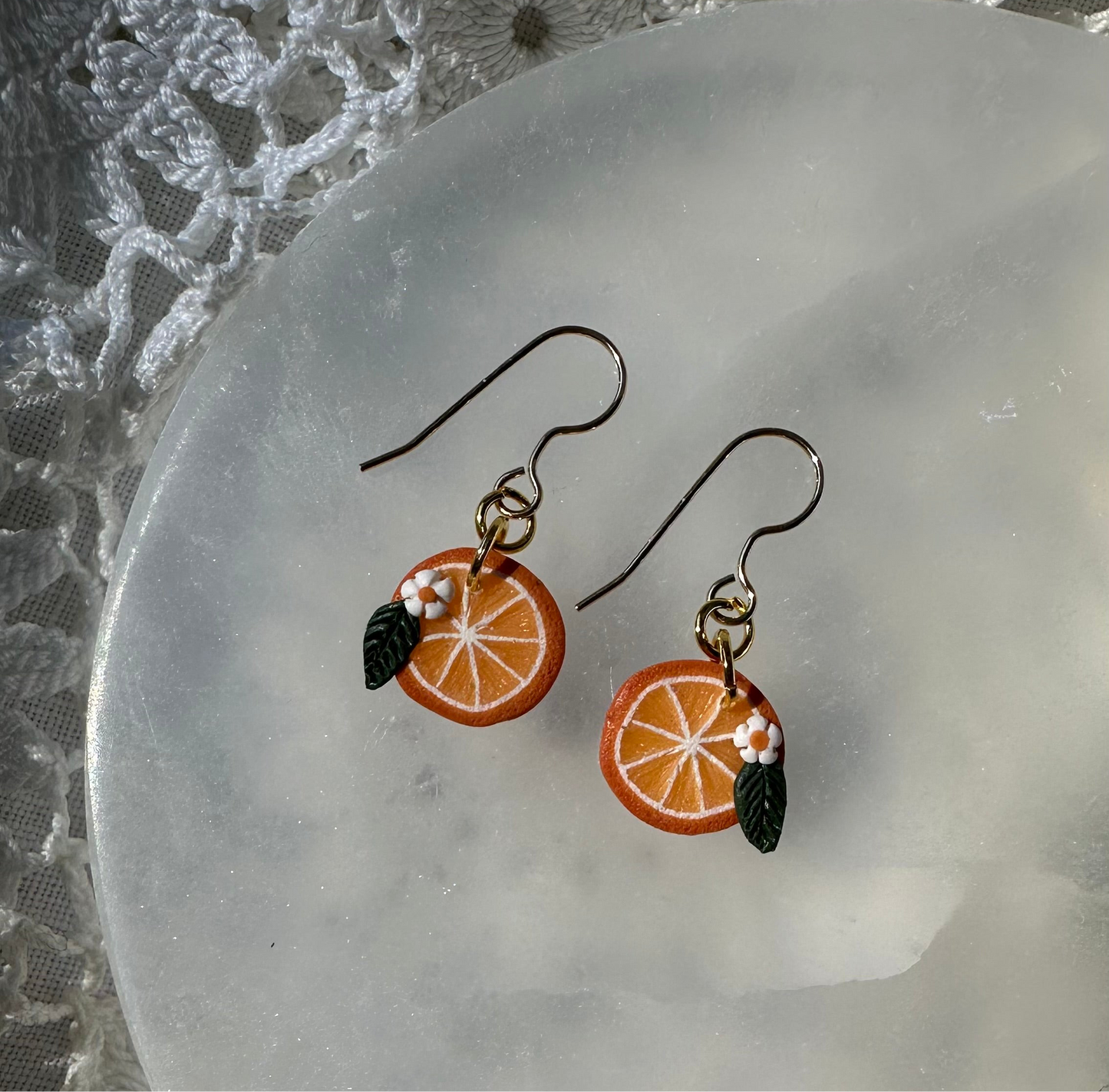 Tiny orange dangles