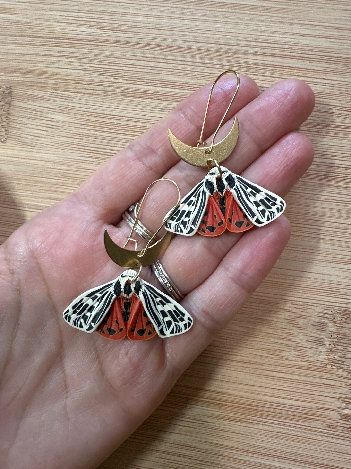 Small Ornate Tiger Moth crescent moon earrings